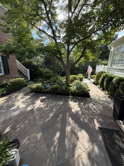 Tidy stone patio after a seasonal cleanup in Maryland